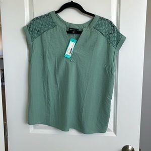 Cute sleeveless top.